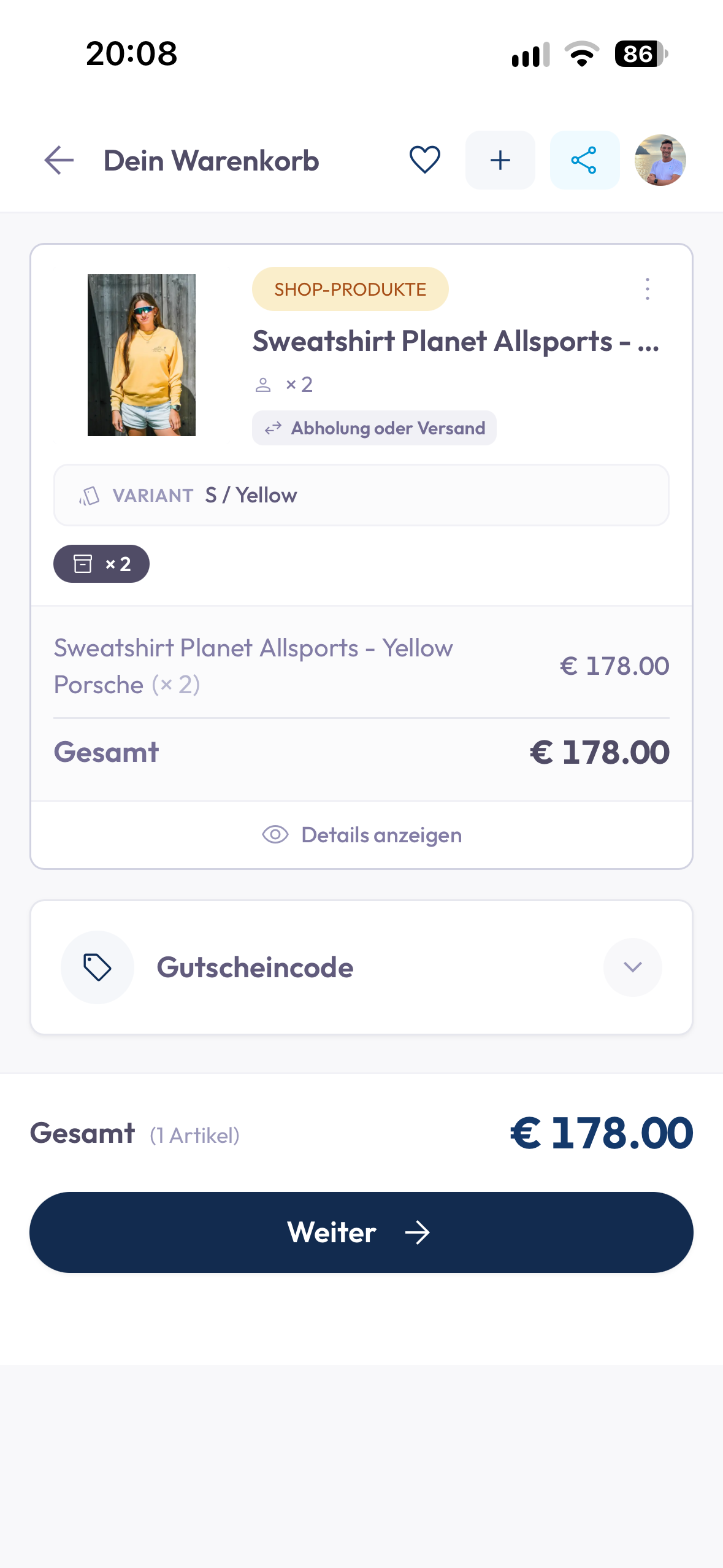 Der Warenkorb mit dem Bereich für den Gutscheincode oberhalb der Gesamtsumme.